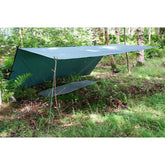 DD Hammocks Ground Dwellers Package featuring the DD 3X3 PRO Tarp set up in a forest setting.